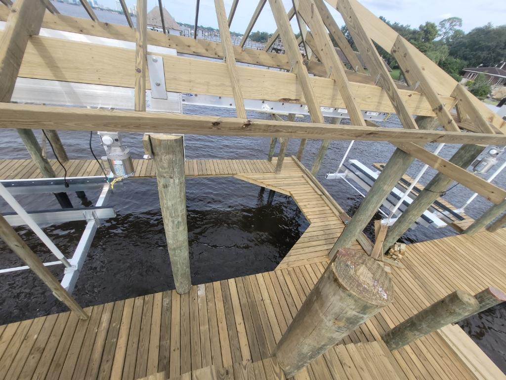 Wooden dock construction over water